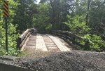 The old wooden trestle overpass is closed